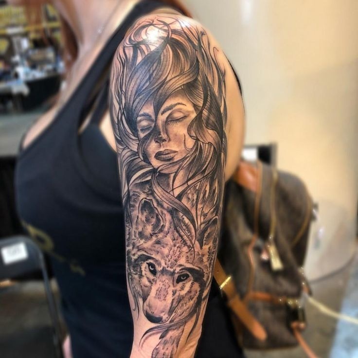 Mysterious Woman and Wolf Tattoo: A Blend of Strength and Grace Tattoo Design