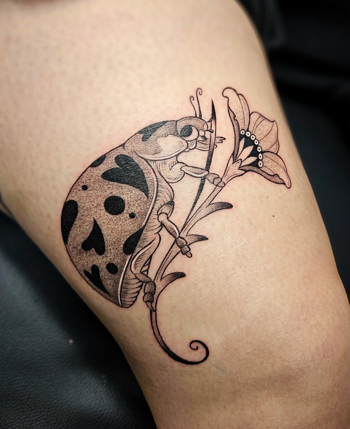 Ladybug on Flower Stem Tattoo Tattoo Design