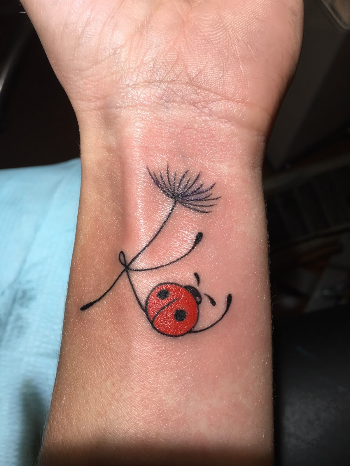 Tiny Ladybug Tattoo Near the Ankle Tattoo Design