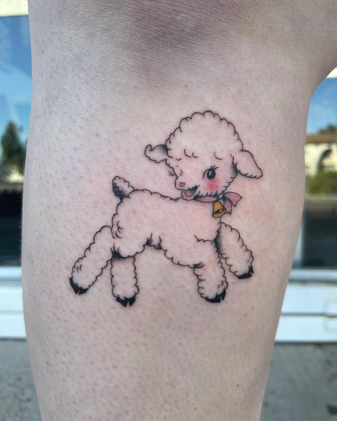 Charming cartoon lamb tattoo with playful vibe Tattoo Design