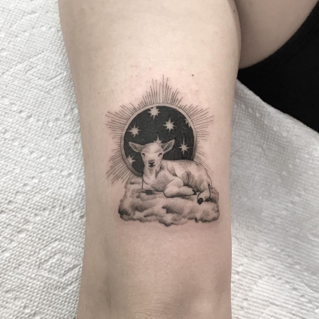 Charming lamb tattoo with celestial elements Tattoo Design