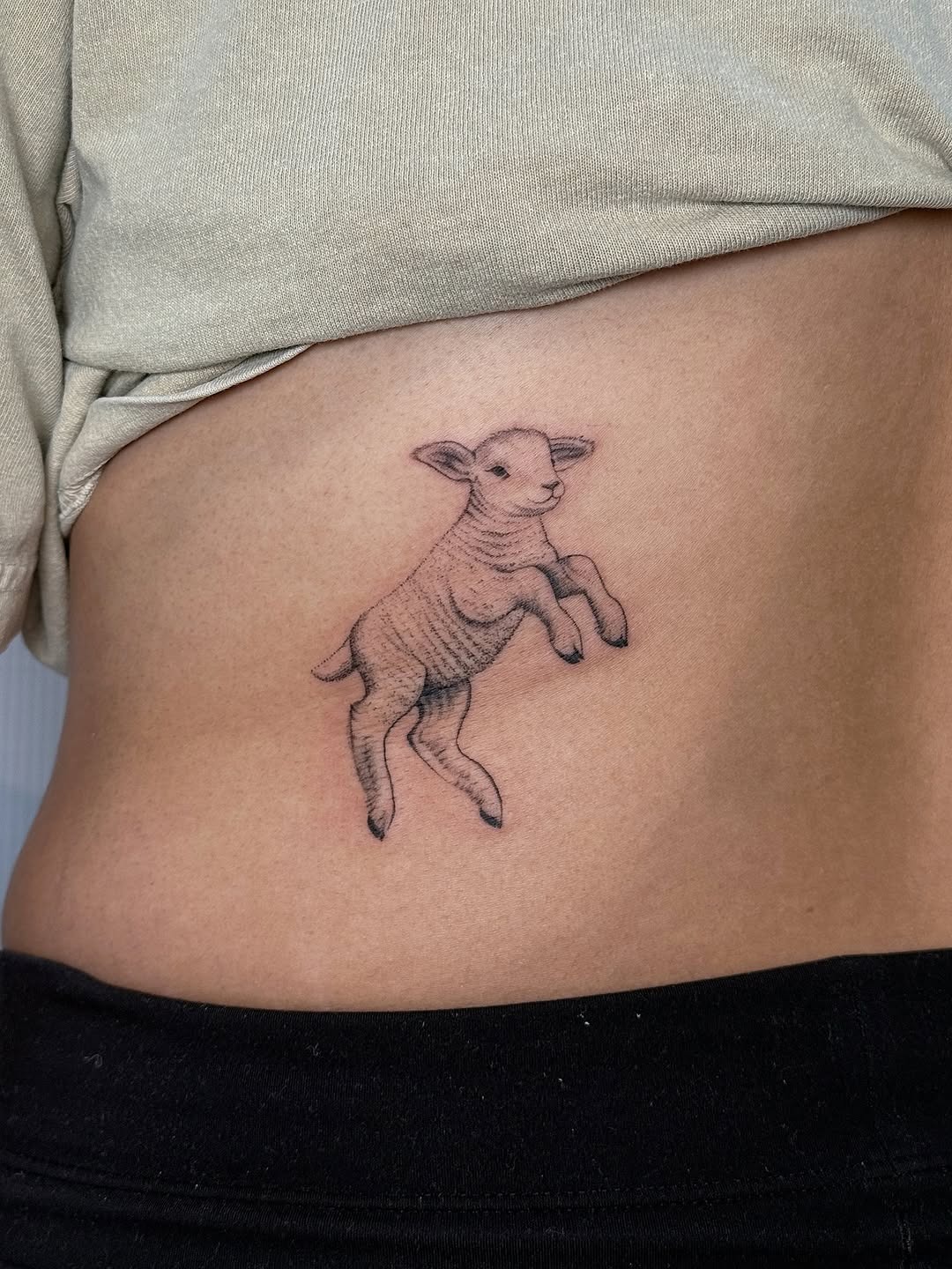 Whimsical jumping lamb tattoo for body art Tattoo Design