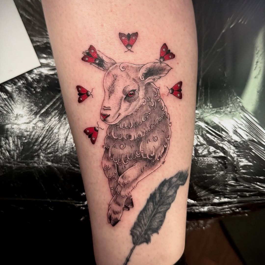 Whimsical lamb tattoo with butterfly accents Tattoo Design