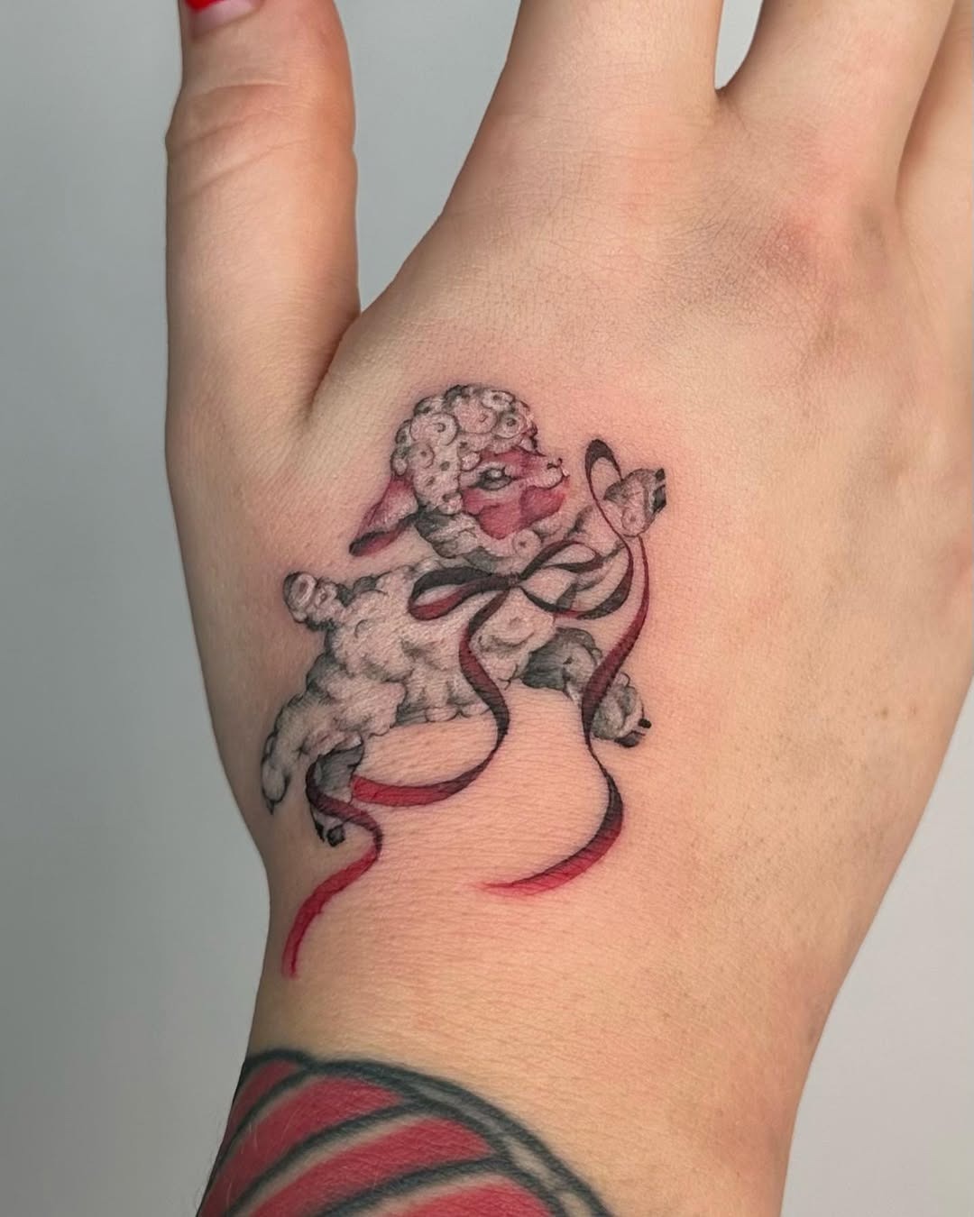 Whimsical lamb tattoo with playful elements Tattoo Design