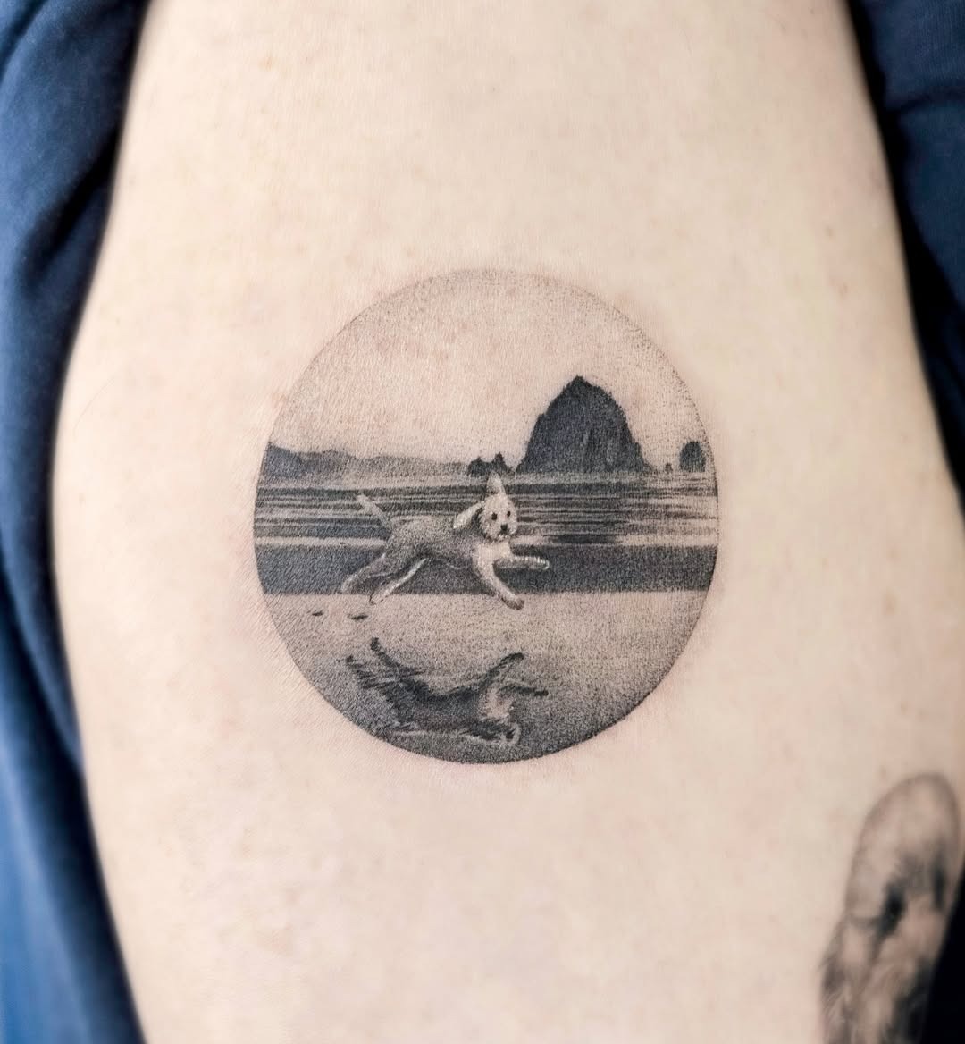 A serene landscape tattoo featuring a playful dog Tattoo Design