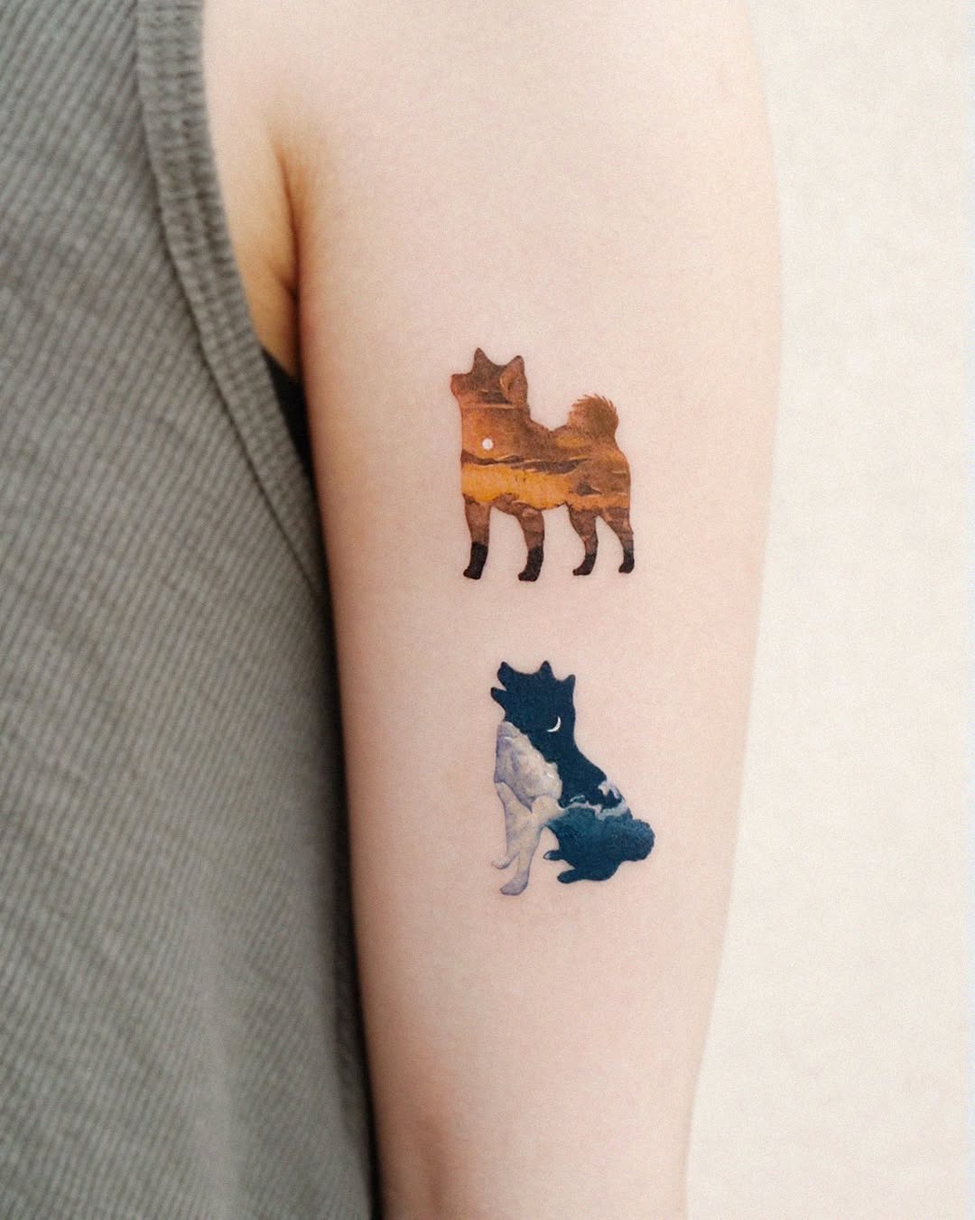 Nature-inspired canine tattoos on a lovely arm Tattoo Design