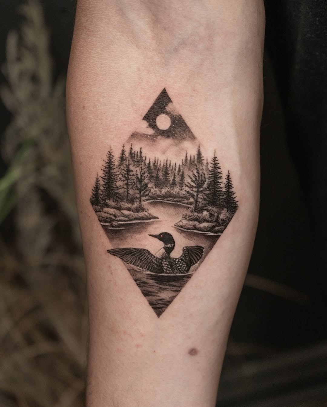 Serene landscape tattoo featuring a tranquil scene. Tattoo Design