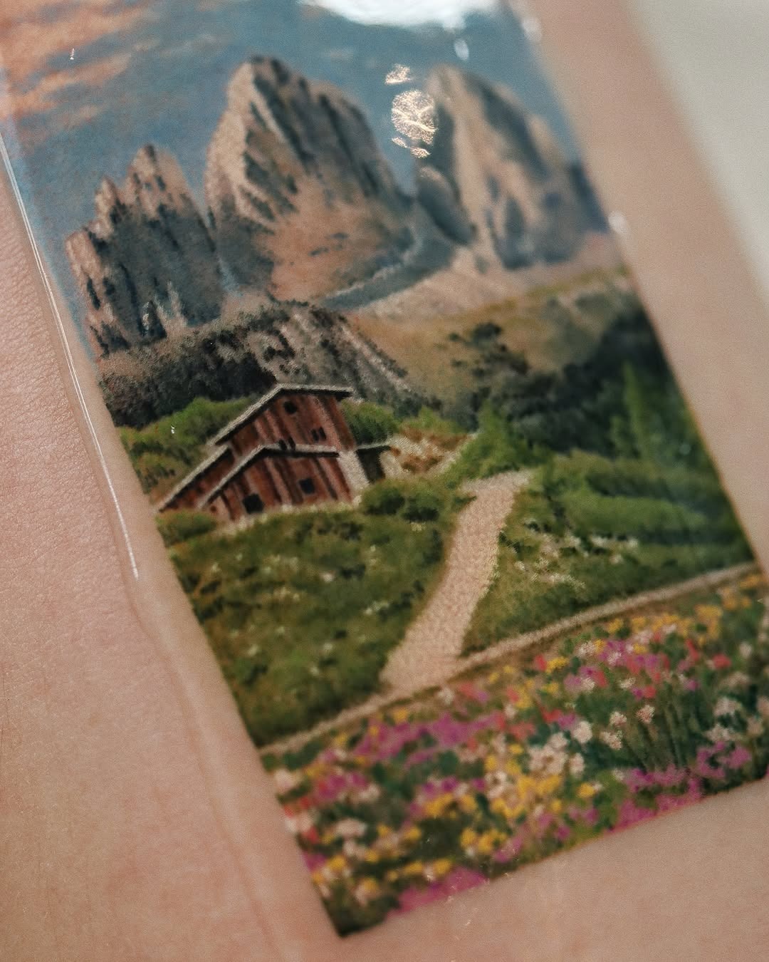 Serene landscape tattoo with vibrant nature details Tattoo Design