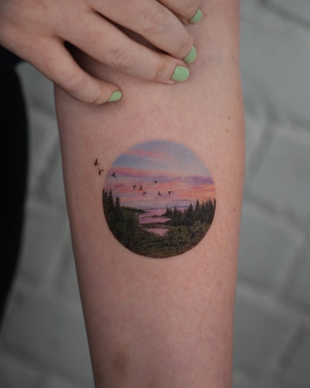 Stunning landscape tattoo featuring serene sunset scene Tattoo Design