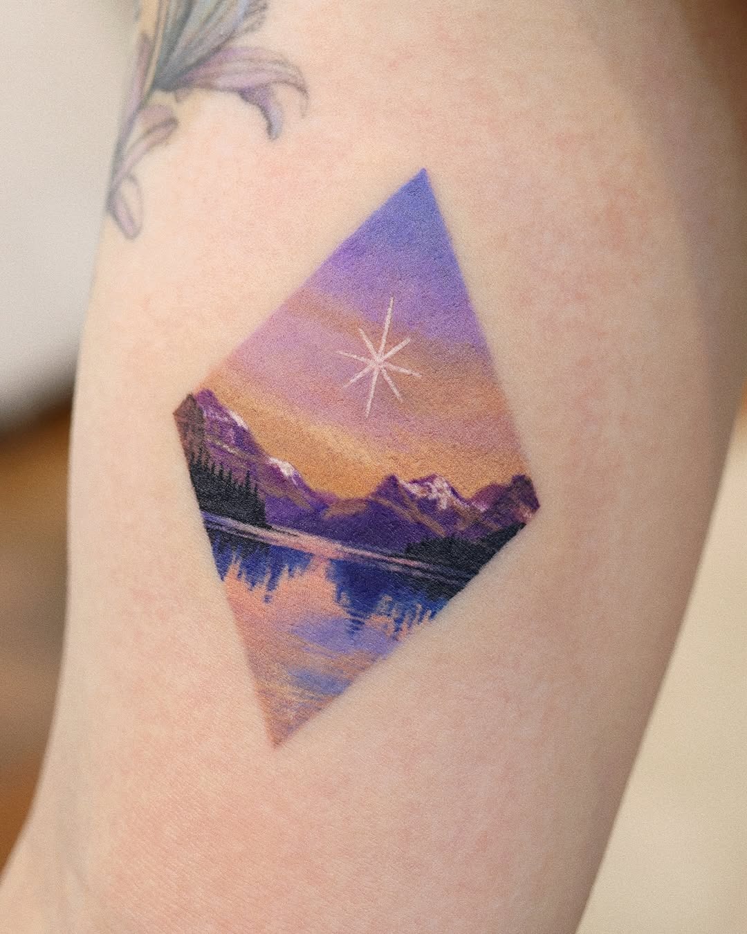 Stunning mountain landscape tattoo with star detail Tattoo Design