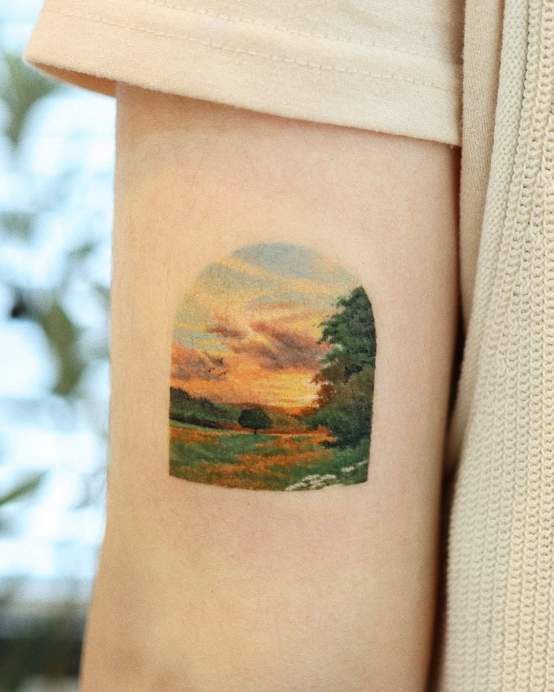 Stunning sunset landscape tattoo on the arm Tattoo Design