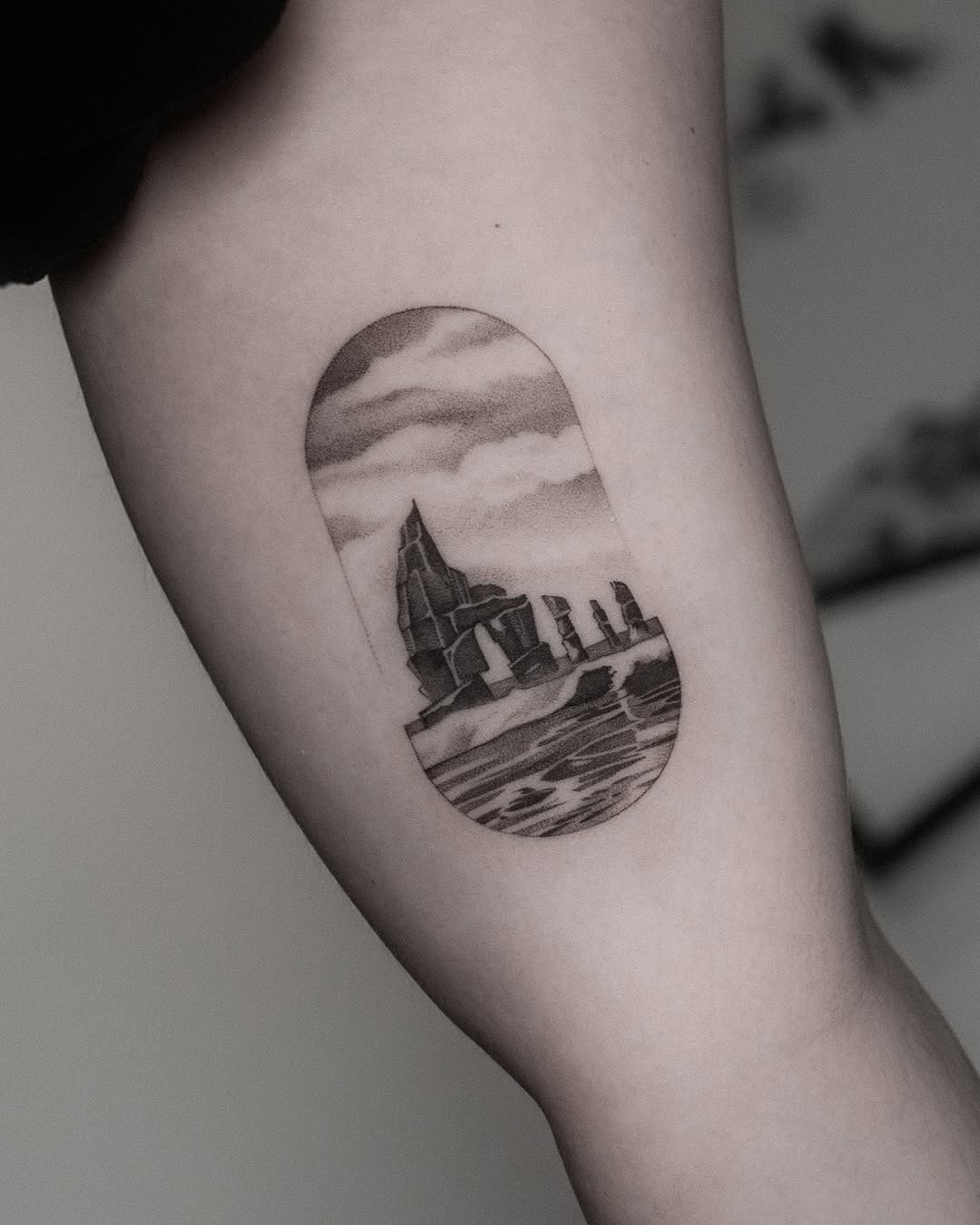 Unique landscape tattoo with rocks and water Tattoo Design