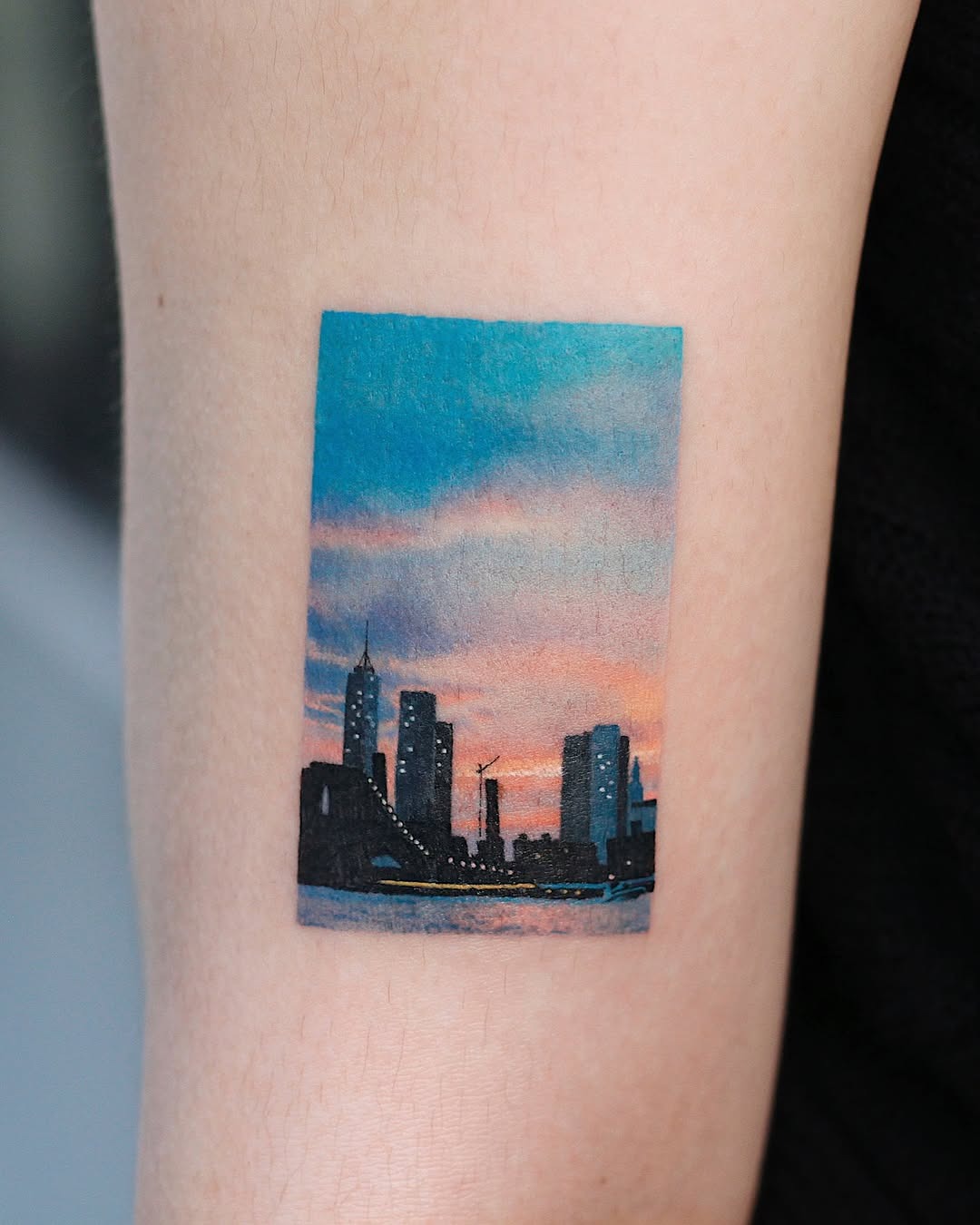 Vibrant cityscape tattoo captures a stunning sunset Tattoo Design