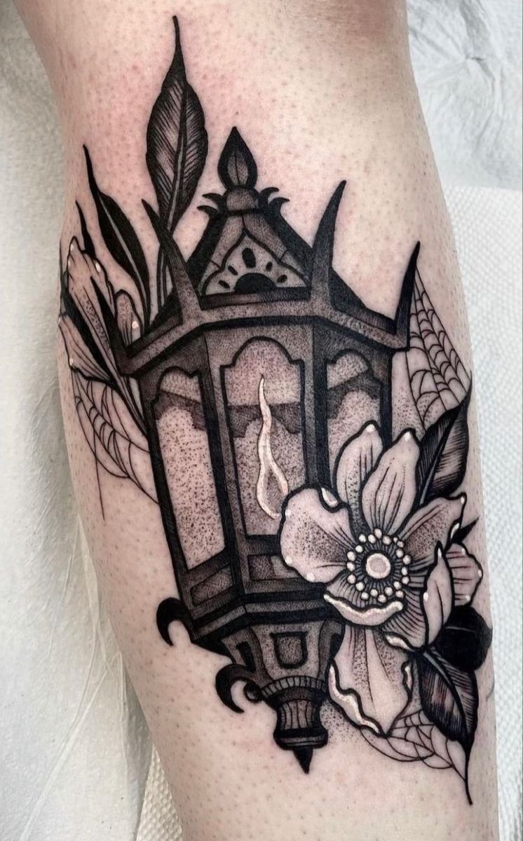 Blackwork Lantern with Floral and Web Details Tattoo Design