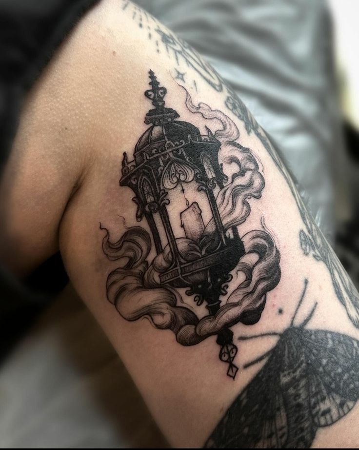Smoky Victorian Lantern with Dramatic Flow Tattoo Design