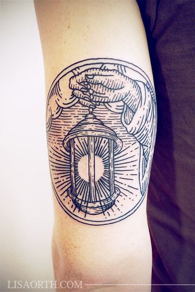 Traditional Hand and Lantern Circle Design Tattoo Design