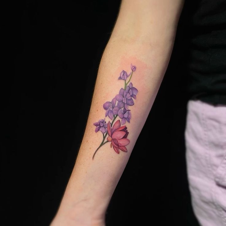 Simple fine-line butterfly and floral stem for a subtle statement Tattoo Design