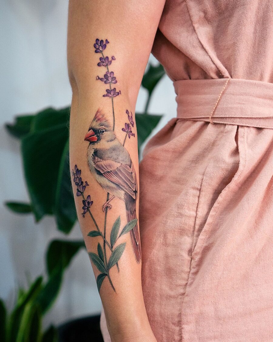 A charming bird among delicate lavender flowers Tattoo Design
