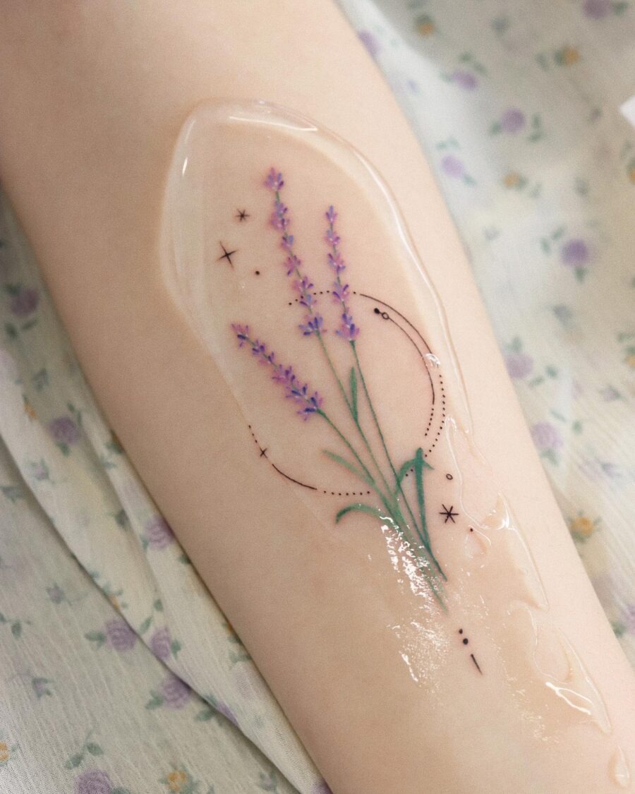 Delicate lavender tattoo with celestial accents Tattoo Design