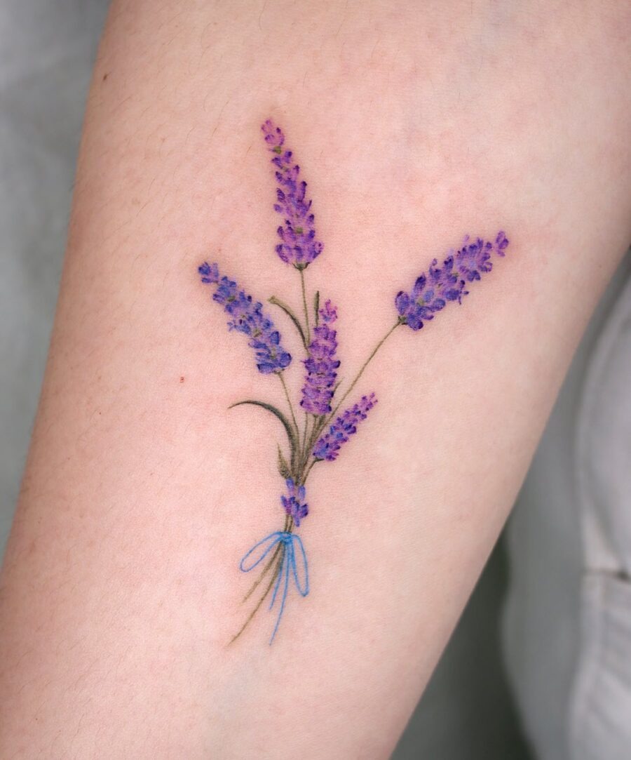 Stunning lavender tattoo bouquet with blue ribbon Tattoo Design
