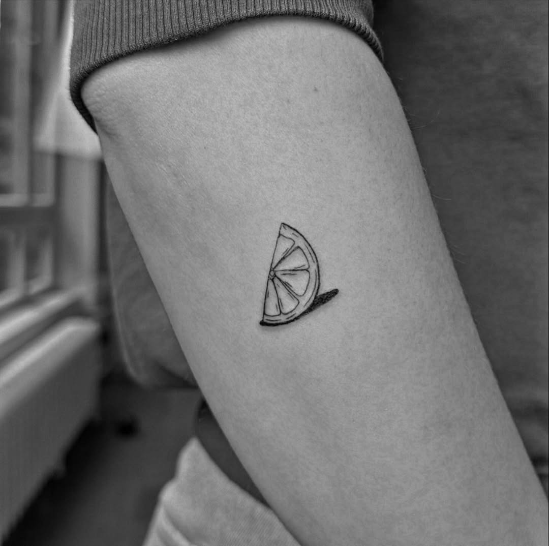 Charming Black and White Lemon Slice Tattoo Tattoo Design