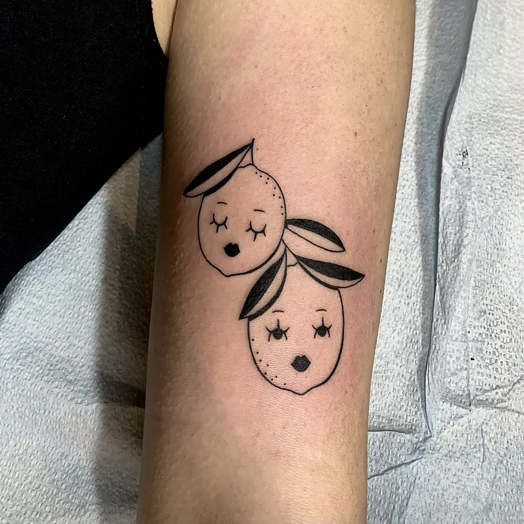 Whimsical Lemon Tattoos with Charming Faces Tattoo Design