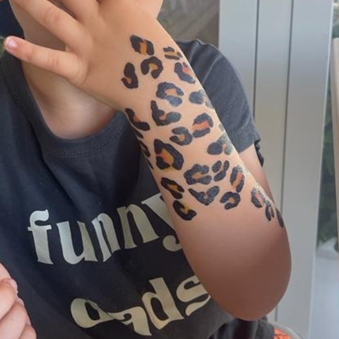 Leopard Print Hand Fan Tattoo Tattoo Design