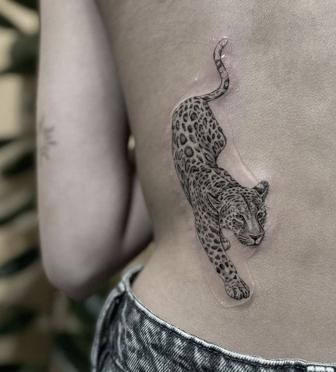 Elegant minimalist leopard tattoo Tattoo Design