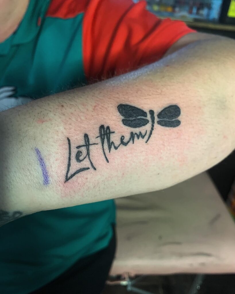 Let Them Tattoo with Bold Black Dragonfly Tattoo Design