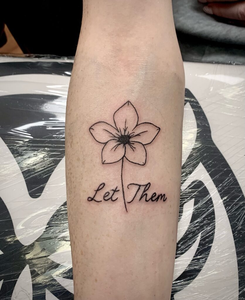 Let Them Tattoo with Delicate Flower Stem Integration Tattoo Design