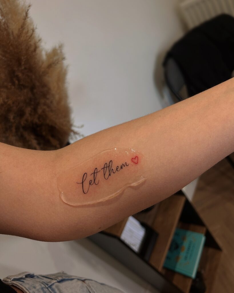 Let Them Tattoo with Red Heart on Inner Arm Tattoo Design