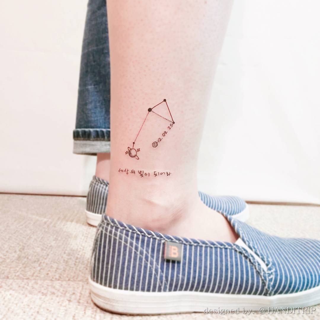 This ankle tattoo features a delicate Libra constellation, combined with a sun detail.