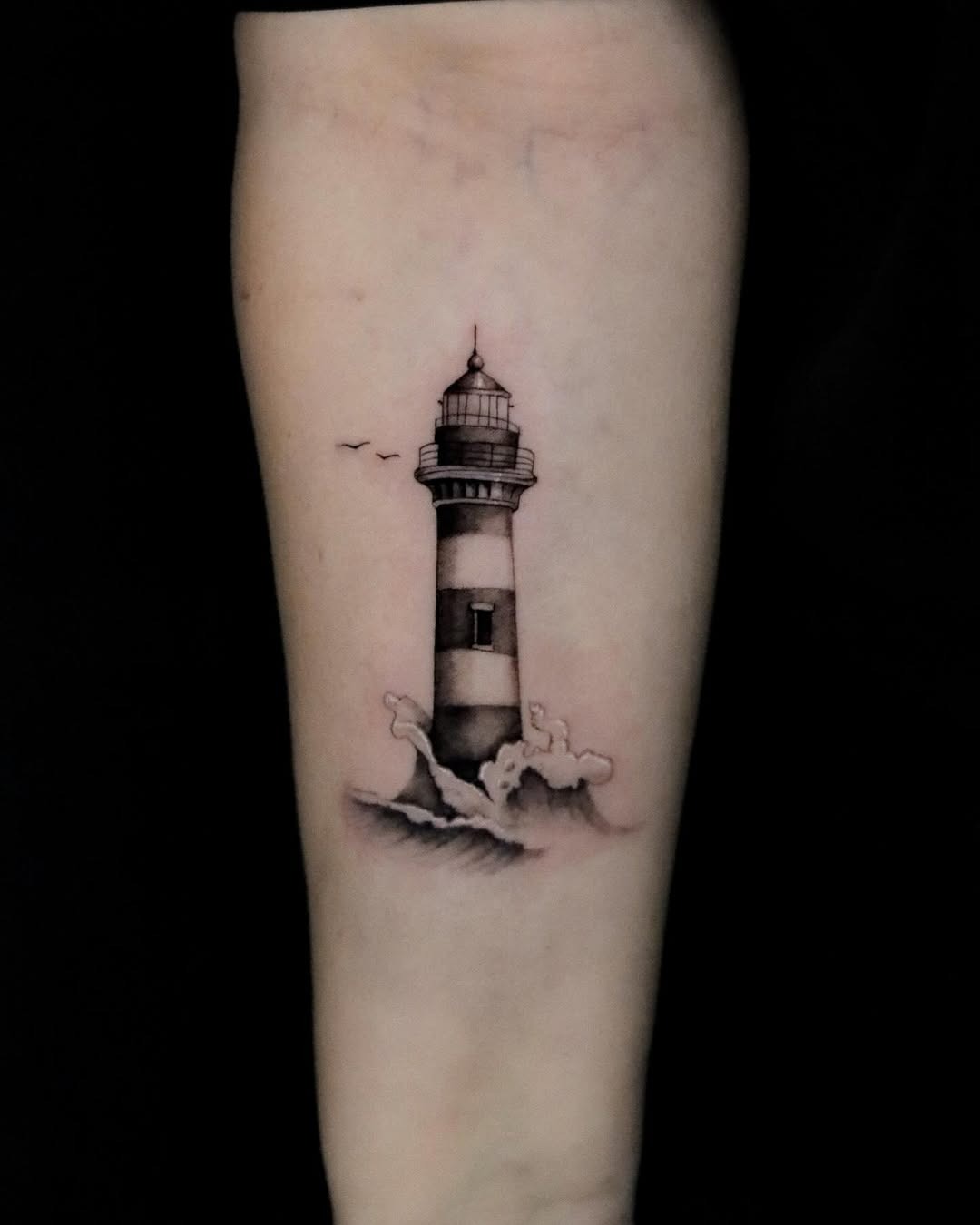 Elegant lighthouse tattoo with waves and birds Tattoo Design