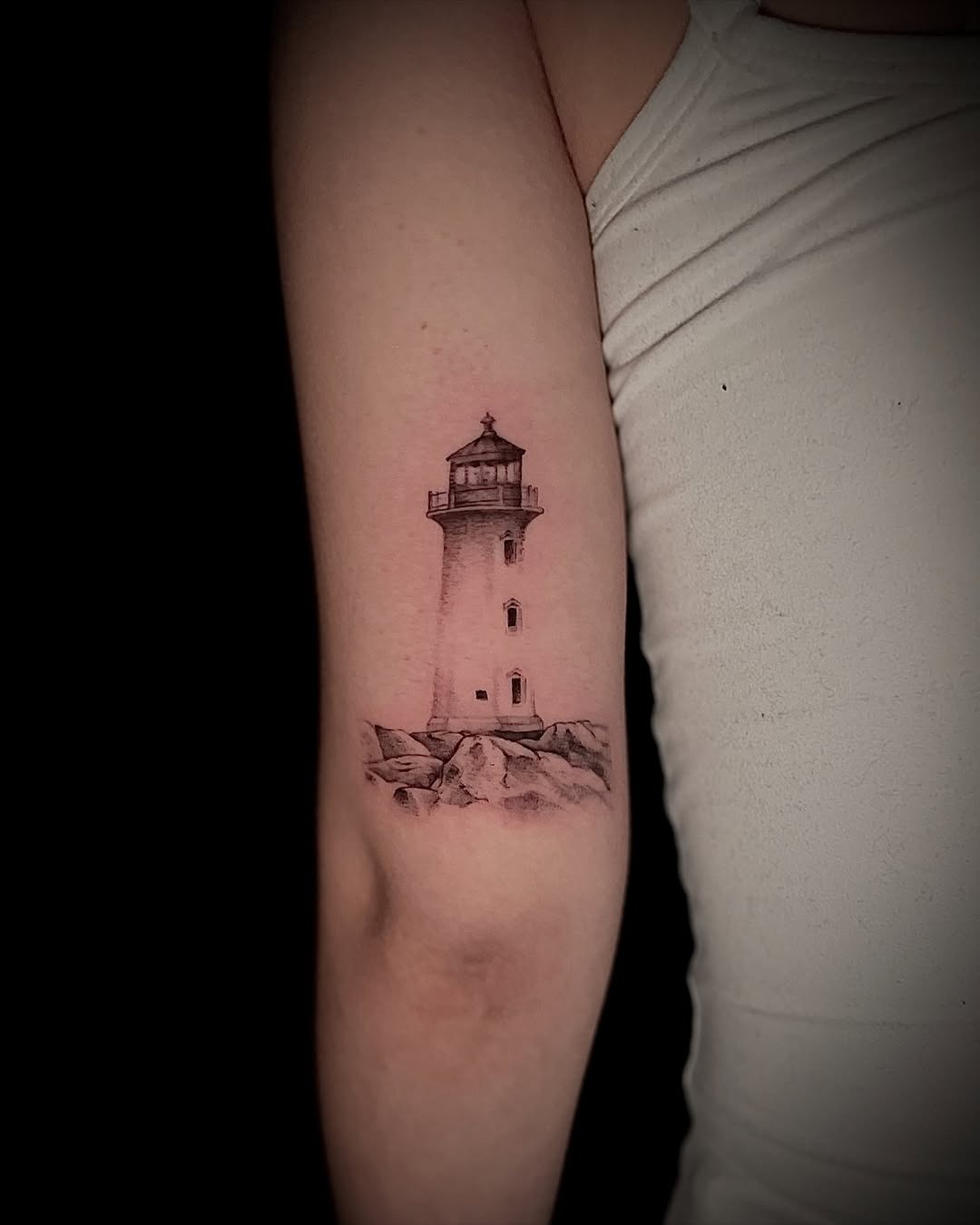 Realistic lighthouse tattoo on arm Tattoo Design