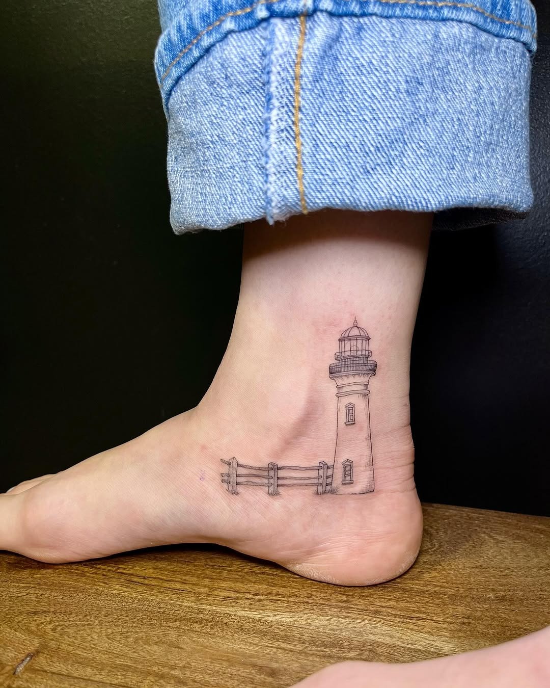 Stunning minimalist lighthouse ankle tattoo Tattoo Design