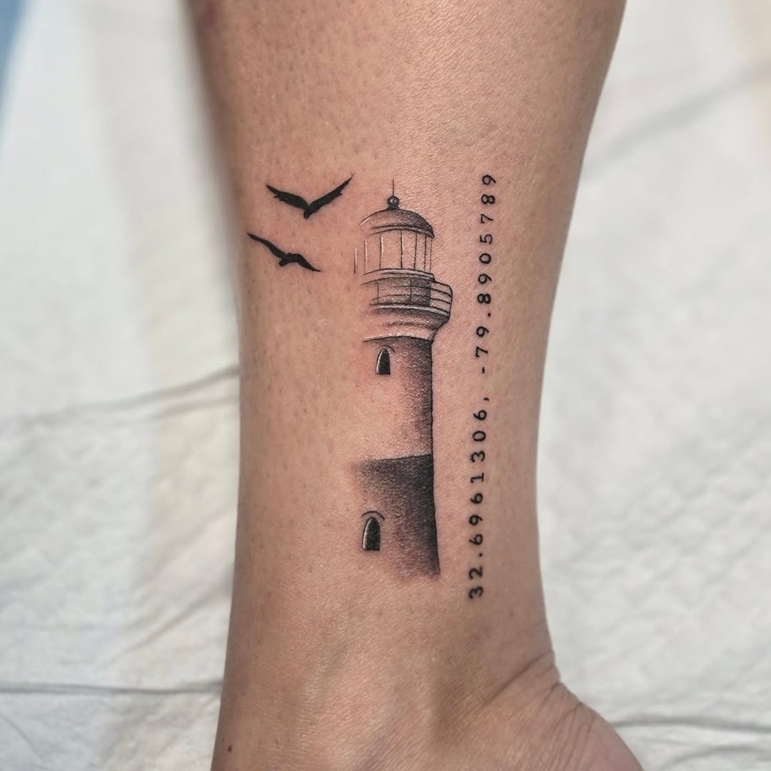 Stylish lighthouse tattoo with serene details Tattoo Design