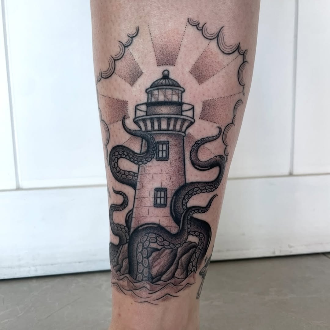 Unique lighthouse tattoo with octopus design Tattoo Design