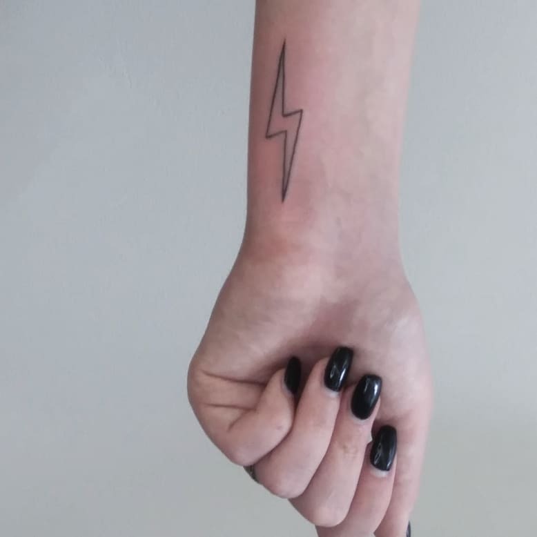 Elegant minimalism in lightning bolt tattoo design Tattoo Design
