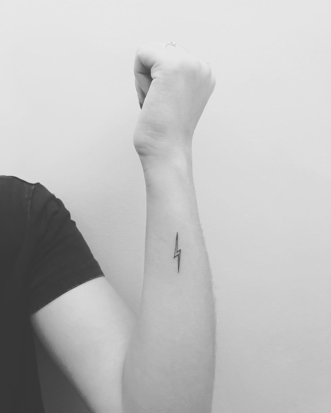 Simple yet striking lightning bolt tattoo design Tattoo Design