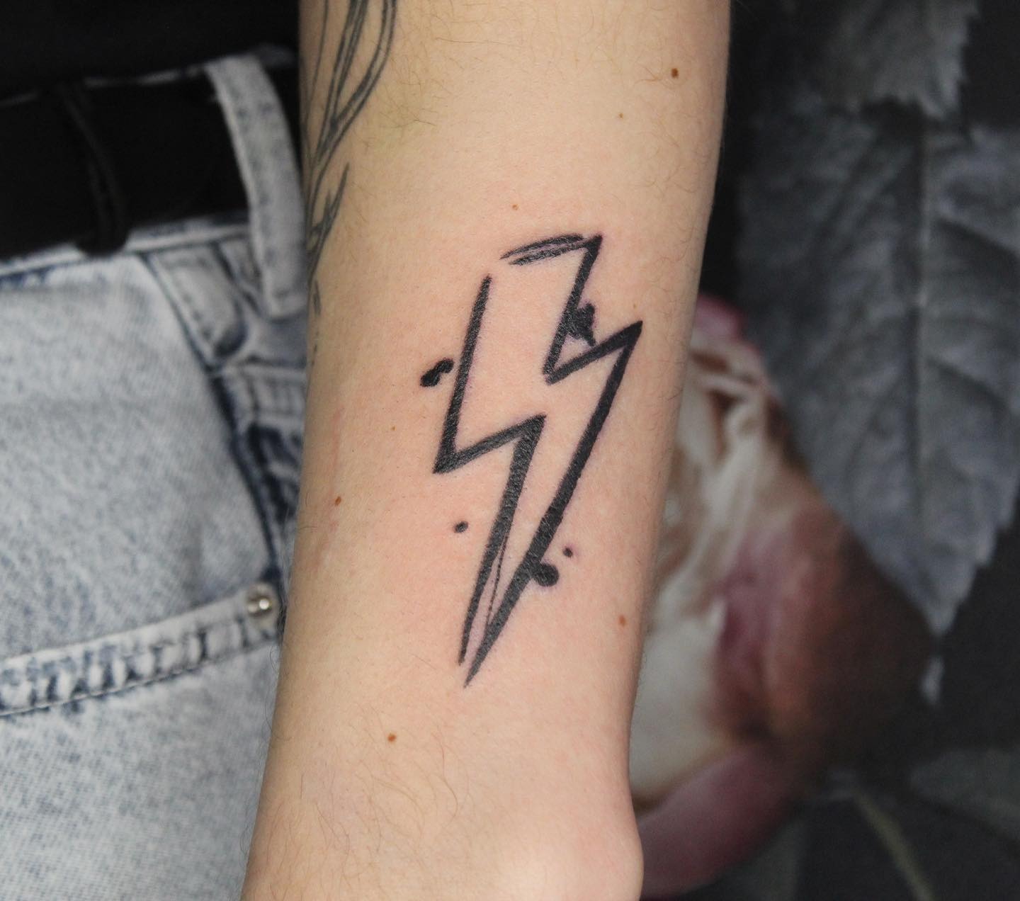 Striking minimalistic lightning bolt tattoo design Tattoo Design