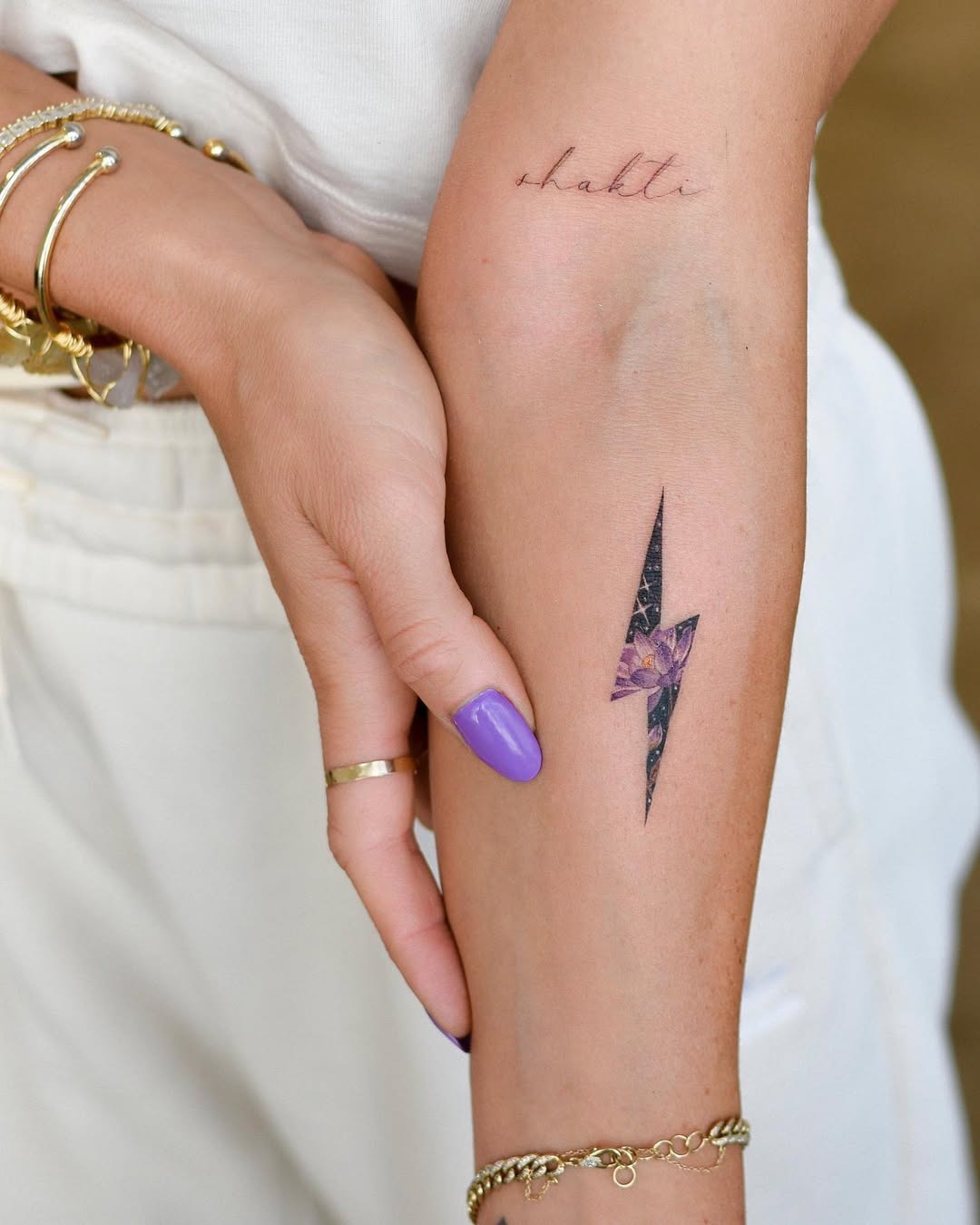 Stylish lightning bolt with floral elements Tattoo Design