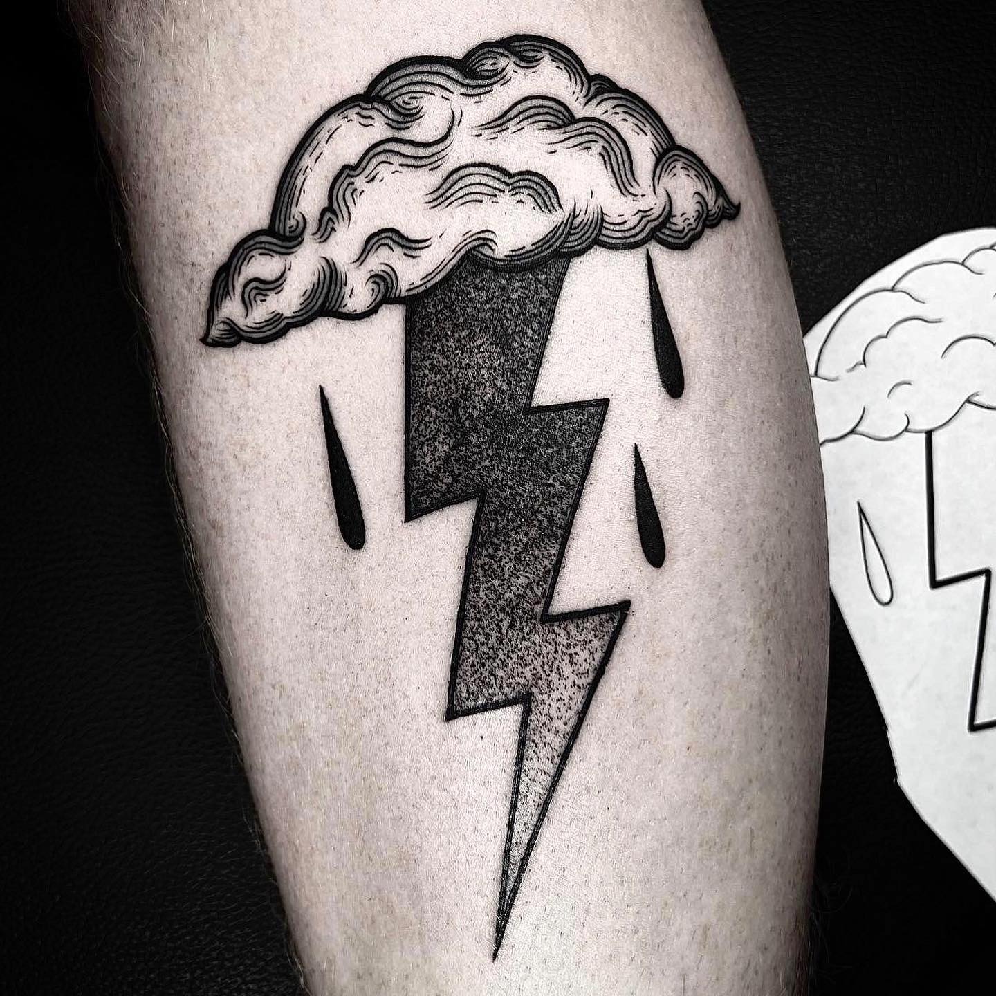 Unique lightning bolt tattoo with cloud design Tattoo Design