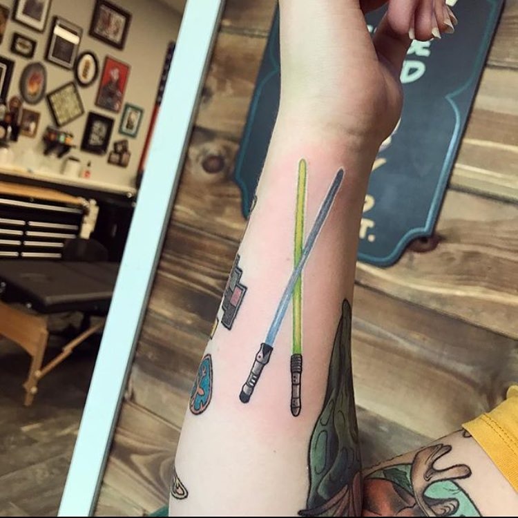 Crossed Lightsabers Forearm Tattoo in Blue and Green Tattoo Design
