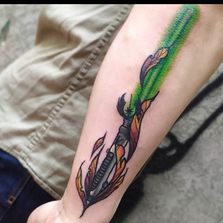 Obi-Wan Kenobi Lightsaber Tattoo with Celestial Spark Tattoo Design