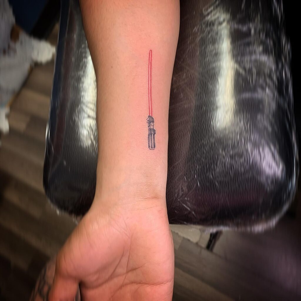 Tiny Red Lightsaber Wrist Tattoo Tattoo Design
