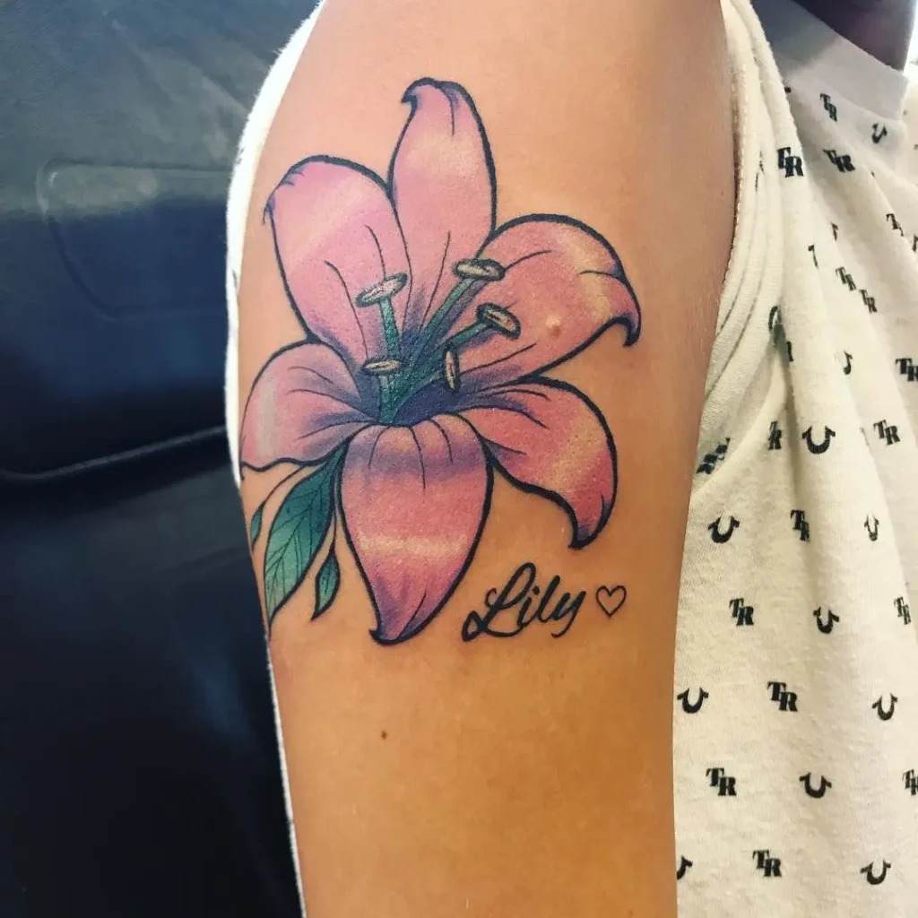 If you're looking to add a personal touch to your lily tattoo, incorporating a name or meaningful word can be a great idea.