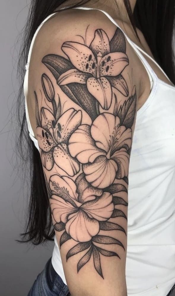 Bold Lily Garden Tattoo, a tattoo design rendered in delicate fine-line.