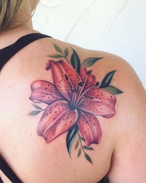 Bright Bloom Lily Tattoo, a tattoo design rendered in bold for the leg.