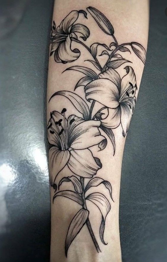 Classic Lily Stem Tattoo, a tattoo design rendered in clean detailed linework.