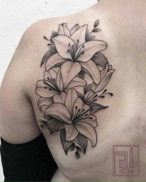 Curved Lily Cluster Tattoo, a tattoo design rendered in clean detailed linework.